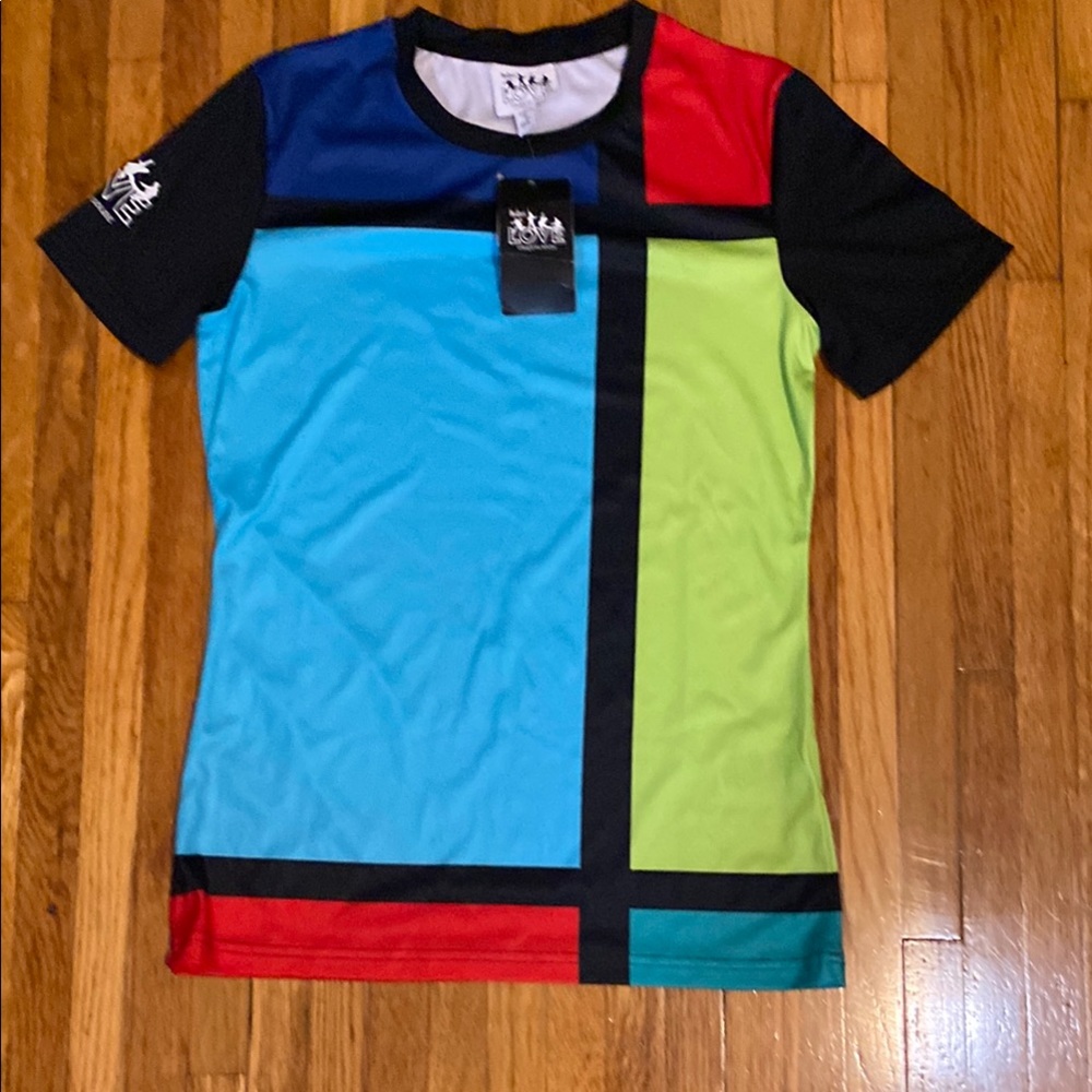 Cirque du Soleil Colorful Geometric Women's Top